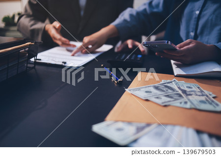 Lawyer explained to the client about the law that must be brought against the court case. Lawyer explained to the client about the law that must be brought against the court case. 139679503