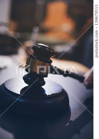 Lawyer explained to the client about the law that must be brought against the court case. Lawyer explained to the client about the law that must be brought against the court case. 139679513
