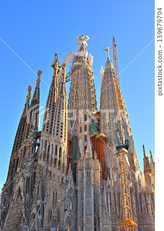 The Sagrada Familia with a cross installed. The Sagrada Familia with a cross installed. 139679704