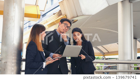 Business Partner using digital tablet online meeting team Partnership businessman, businesswoman talking together. Diversity Asian Business Partner online meeting trust teamwork. Asian Business team Business Partner using digital tablet online meeting team Partnership businessman, businesswoman talking together. Diversity Asian Business Partner online meeting trust teamwork. Asian Business team 139679741
