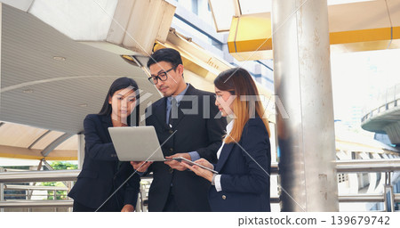 Business Partner using digital tablet online meeting team Partnership businessman, businesswoman talking together. Diversity Asian Business Partner online meeting trust teamwork. Asian Business team Business Partner using digital tablet online meeting team Partnership businessman, businesswoman talking together. Diversity Asian Business Partner online meeting trust teamwork. Asian Business team 139679742