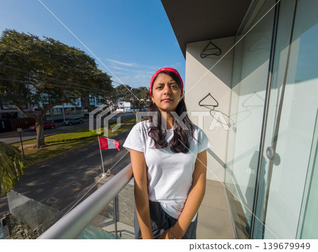 Casual Portrait on City Balcony Casual Portrait on City Balcony 139679949