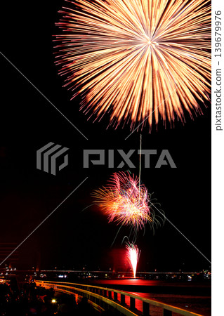 Summer fireworks display that lights up the waterfront 139679976