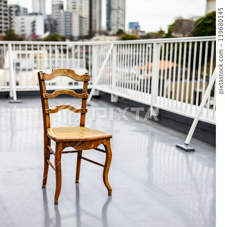 Antique chairs on the rooftop terrace Antique chairs on the rooftop terrace 139680145