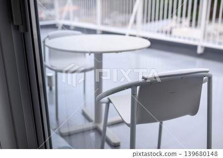 White table and chairs on the balcony 139680148