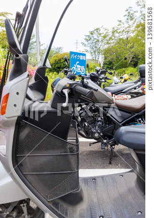 Outdoor motorcycle parking area and parked motorcycles Outdoor motorcycle parking area and parked motorcycles 139681568