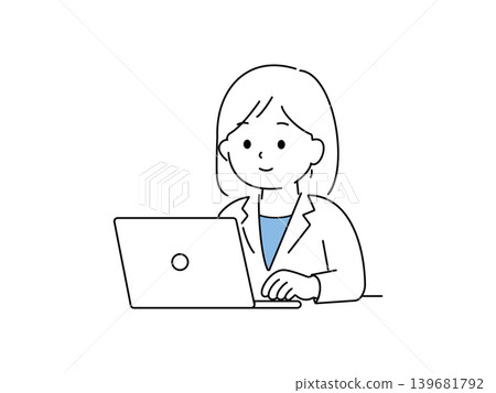 A woman in a suit working on her computer. A woman in a suit working on her computer. 139681792