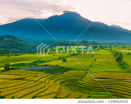 The natural beauty of the Indonesian mountains with beautiful tropical forests at sunrise The natural beauty of the Indonesian mountains with beautiful tropical forests at sunrise 139682026
