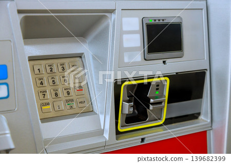 Close view of an automated teller machine with keypad card slot Close view of an automated teller machine with keypad card slot 139682399
