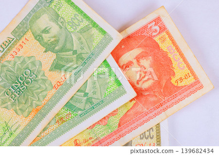 Cuban pesos CUC banknotes assortment representing various denomination currency values Cuban pesos CUC banknotes assortment representing various denomination currency values 139682434