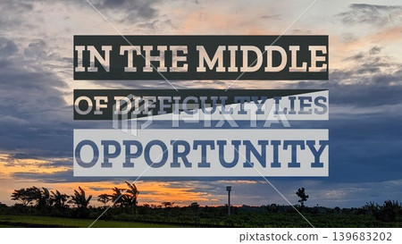 A profound quote, In the middle of difficulty lies opportunity, displayed against a serene landscape with a sunrise sky, reminding us to find positive prospects amidst challenges. 139683202
