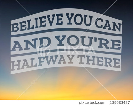 An empowering quote. Believe you can and you're halfway there, set against a beautiful sunrise sky, emphasizing the power of self-belief in achieving goals. 139683427