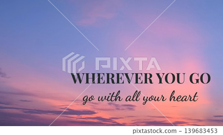Wherever you go, go with all your heart - a powerful quote set against a beautiful sunrise or sunset sky, inspiring dedication and passion in every endeavor. 139683453
