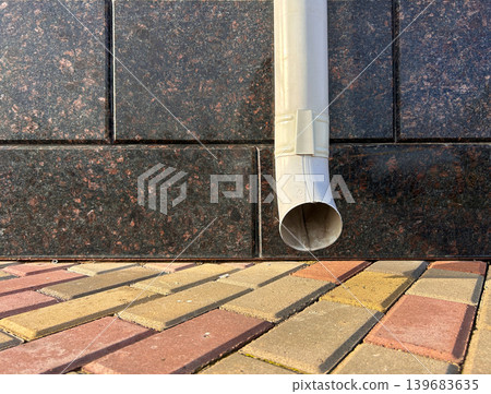 Drainpipe on the wall Drainpipe on the wall 139683635