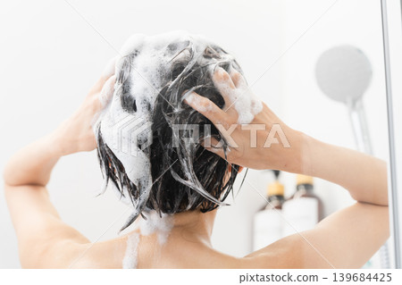 Woman shampooing beauty image Woman shampooing beauty image 139684425