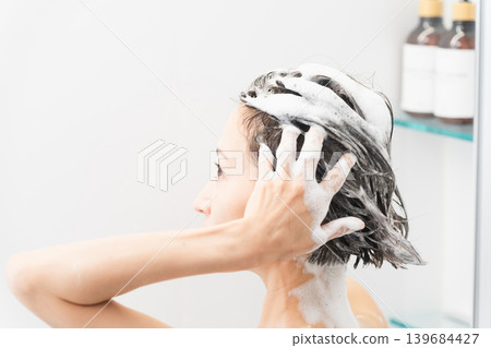 Woman shampooing beauty image Woman shampooing beauty image 139684427