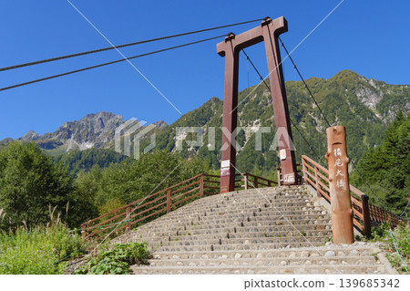 Summer view of the Hotaka mountain range from Yokoo Bridge Summer view of the Hotaka mountain range from Yokoo Bridge 139685342