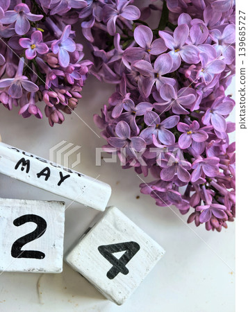 Purple Lilac Blossoms With May Twenty Fourth Calendar Date Purple Lilac Blossoms With May Twenty Fourth Calendar Date 139685727