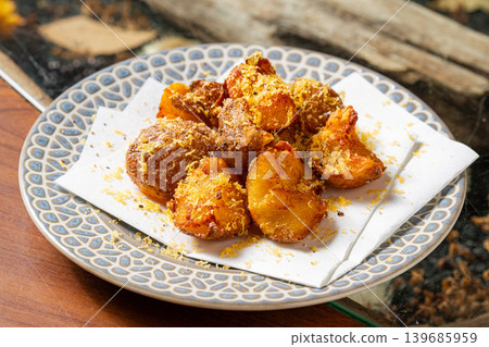French fries: A classic and popular menu item with a crispy texture. French fries: A classic and popular menu item with a crispy texture. 139685959