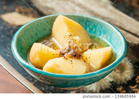 Oden potatoes: A hearty, Japanese-style stewed dish where potatoes soak up the delicious broth. Oden potatoes: A hearty, Japanese-style stewed dish where potatoes soak up the delicious broth. 139685984