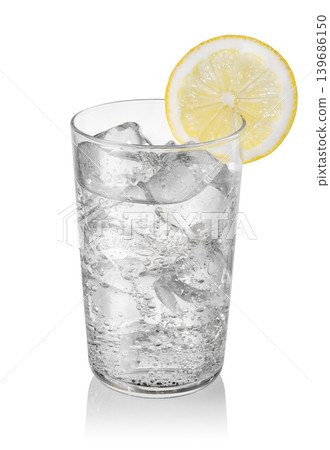 Glass of sparkling water with lemon and ice isolated on white background Glass of sparkling water with lemon and ice isolated on white background 139686150