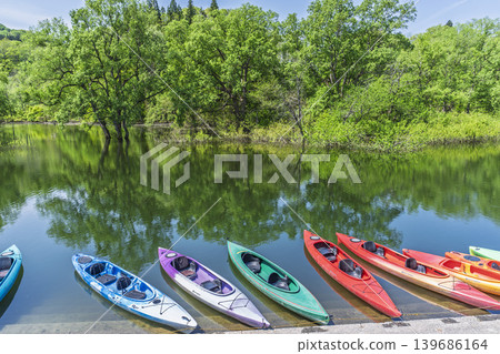 Lake Shirakawa in lush greenery and submerged forest; canoeing and the lake surface; Iide Town, Yamagata Prefecture Lake Shirakawa in lush greenery and submerged forest; canoeing and the lake surface; Iide Town, Yamagata Prefecture 139686164