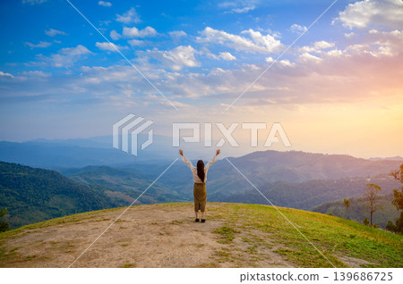 mountains, sunrise, woman, young, happy, scenic, sun, summer, rock, tourist, beautiful, high, mountain, view, fall, freedom, top, man, female, hand, sky, nature, hiking, hike, peak, girl, people, morn 139686725