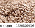 Macro view of natural plant based cat litter made from compressed biodegradable vegetable fibers.  139686936