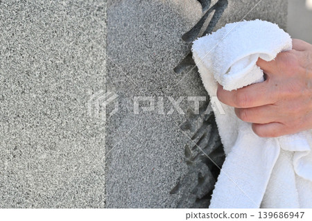 Seniors cleaning graves Seniors cleaning graves 139686947