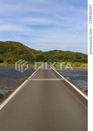 Sada Submersible Bridge, surrounded by fresh greenery in Shimanto City, Kochi Prefecture Sada Submersible Bridge, surrounded by fresh greenery in Shimanto City, Kochi Prefecture 139686995