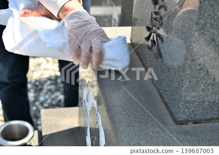 Seniors cleaning graves Seniors cleaning graves 139687003