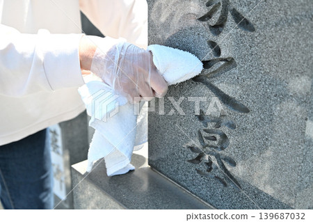 Seniors cleaning graves Seniors cleaning graves 139687032