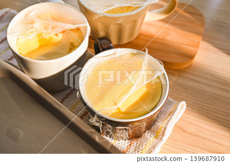 Traditional homemade pudding made in the microwave Traditional homemade pudding made in the microwave 139687910