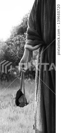 Man's hand with an old sling Man's hand with an old sling 139688720
