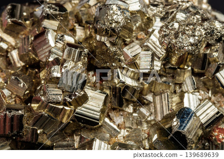 Macro mineral stone Pyrite on a black background Macro mineral stone Pyrite on a black background 139689639