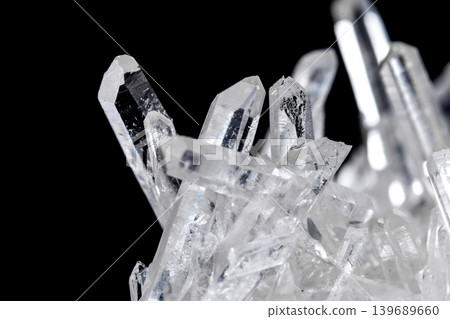 Macro Mineral Stone Rhinestone in Crystals on a Black Background Macro Mineral Stone Rhinestone in Crystals on a Black Background 139689660