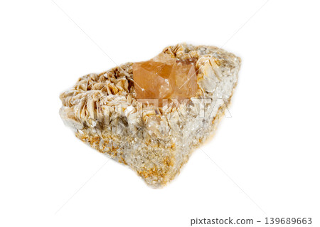 Macro mineral stone Scheelite on a white background Macro mineral stone Scheelite on a white background 139689663