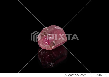 macro mineral tourmaline stone on black background macro mineral tourmaline stone on black background 139690763