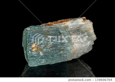 macro mineral stone aquamarine on a black background macro mineral stone aquamarine on a black background 139690764