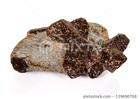 macro mineral stone Staurolite on a white background 139690768
