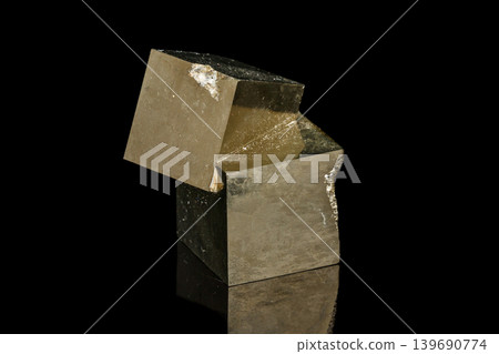 Macro mineral stone Pyrite on a black background Macro mineral stone Pyrite on a black background 139690774