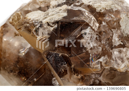 Macro mineral stone smoky quartz on a white background Macro mineral stone smoky quartz on a white background 139690805