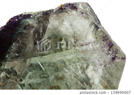 Macro of a mineral stone Fluorite on a white background Macro of a mineral stone Fluorite on a white background 139690807