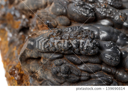Macro mineral Hematite stone on a white background close-up 139690814