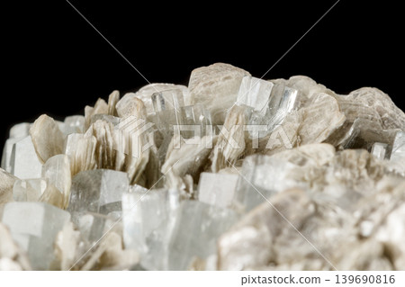 Macro mineral stone Aquamarine in rock on a black background 139690816