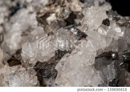 Macro mineral stone Stibnite quartz on a black background 139690818