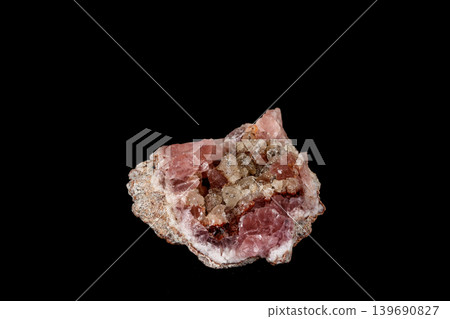 Macro mineral stone Pink Amethyst on a black background 139690827