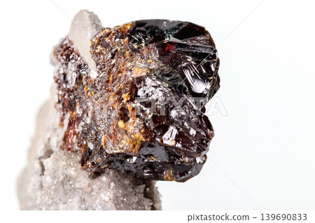 Macro of mineral Sphalerite stone on microcline on white background 139690833