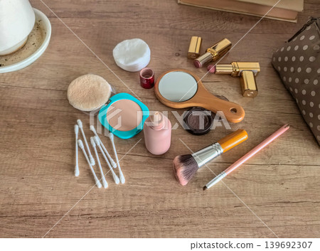 Organized makeup vanity setup with beauty tools Organized makeup vanity setup with beauty tools 139692307