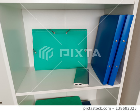 Organized Office Shelf with Folders and Power Bank Organized Office Shelf with Folders and Power Bank 139692323
